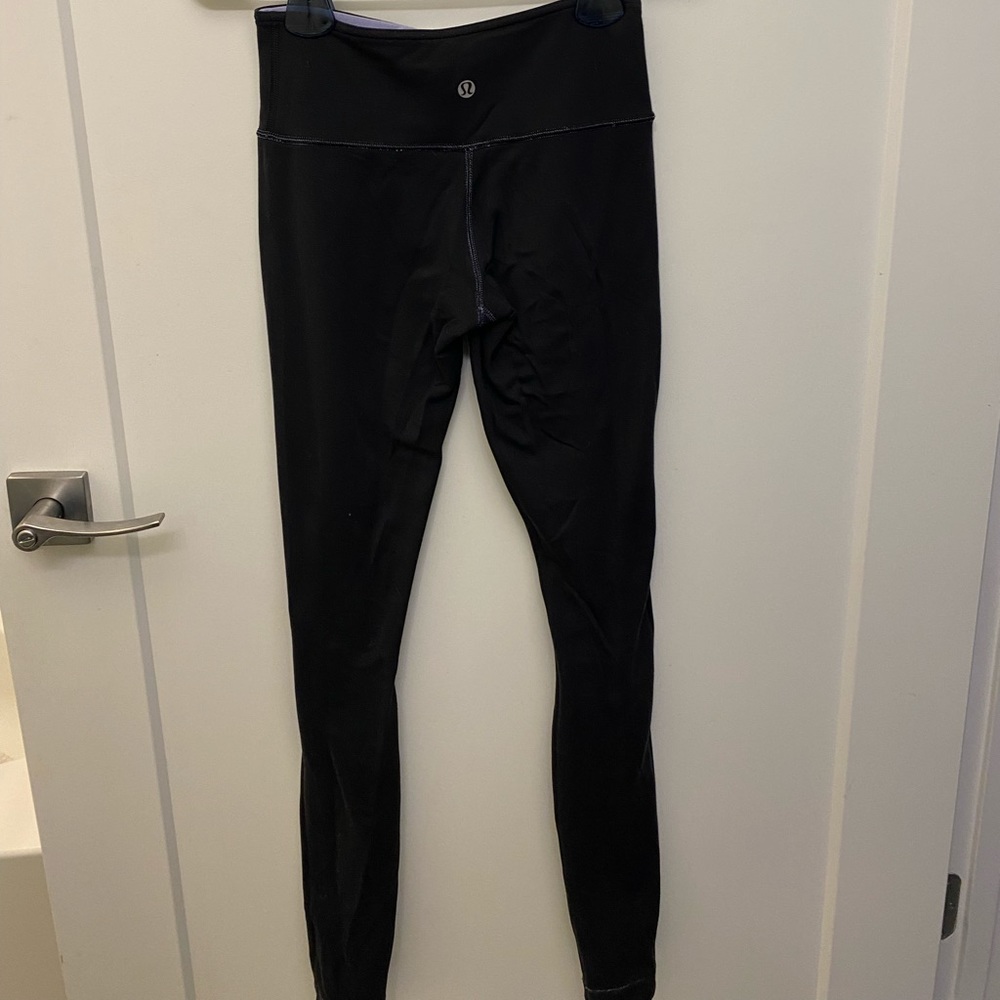 Lululemon reversible black and light purple leggings size 4